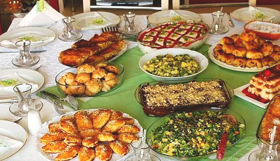 An example of a classic gold gathering table full of food