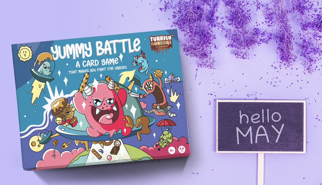 A picture of Yummy battle may box with purple flowers around it